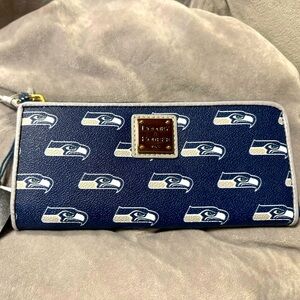 Seattle Seahawks wallet with zippers.